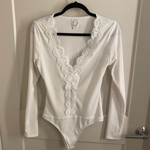 Lace trim bodysuit